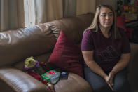 Laura Ramos becomes emotional when speaking about her brother Jerry Ramos at the Ramos family home in Watsonville, Calif., Sunday, June 6, 2021. He died Feb. 15 at age 32, becoming not just one of the roughly 600,000 Americans who have now perished in the outbreak but another example of the virus’s strikingly uneven and ever-shifting toll on the nation’s racial and ethnic groups. (AP Photo/Nic Coury)