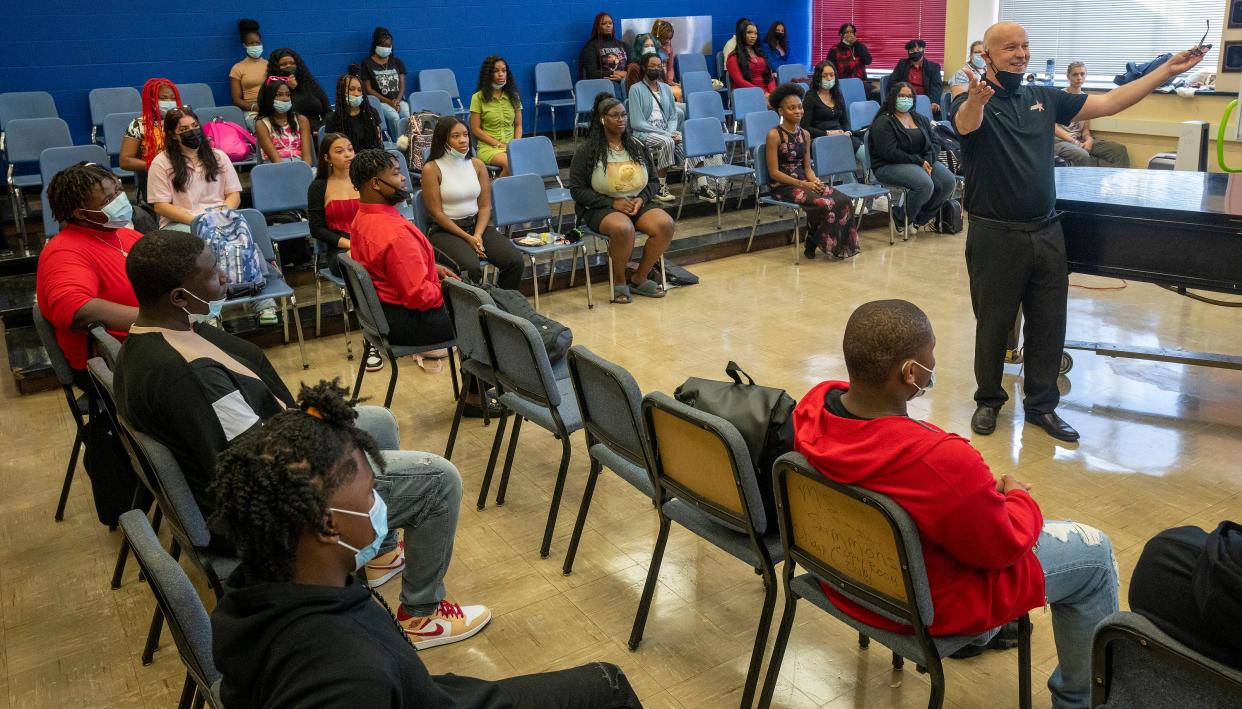 Teacher Raymond Roberts leads a vocal music class Monday at Milwaukee High School of the Arts Aug. 15, the first day of school for the 1,100 students who attend the school.