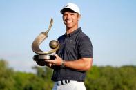 Mar 24, 2019; Palm Harbor, FL, USA; Paul Casey holds the winners trophy after winning the Valspar Championship golf tournament at Innisbrook Resort - Copperhead Course. Mandatory Credit: Jasen Vinlove-USA TODAY Sports