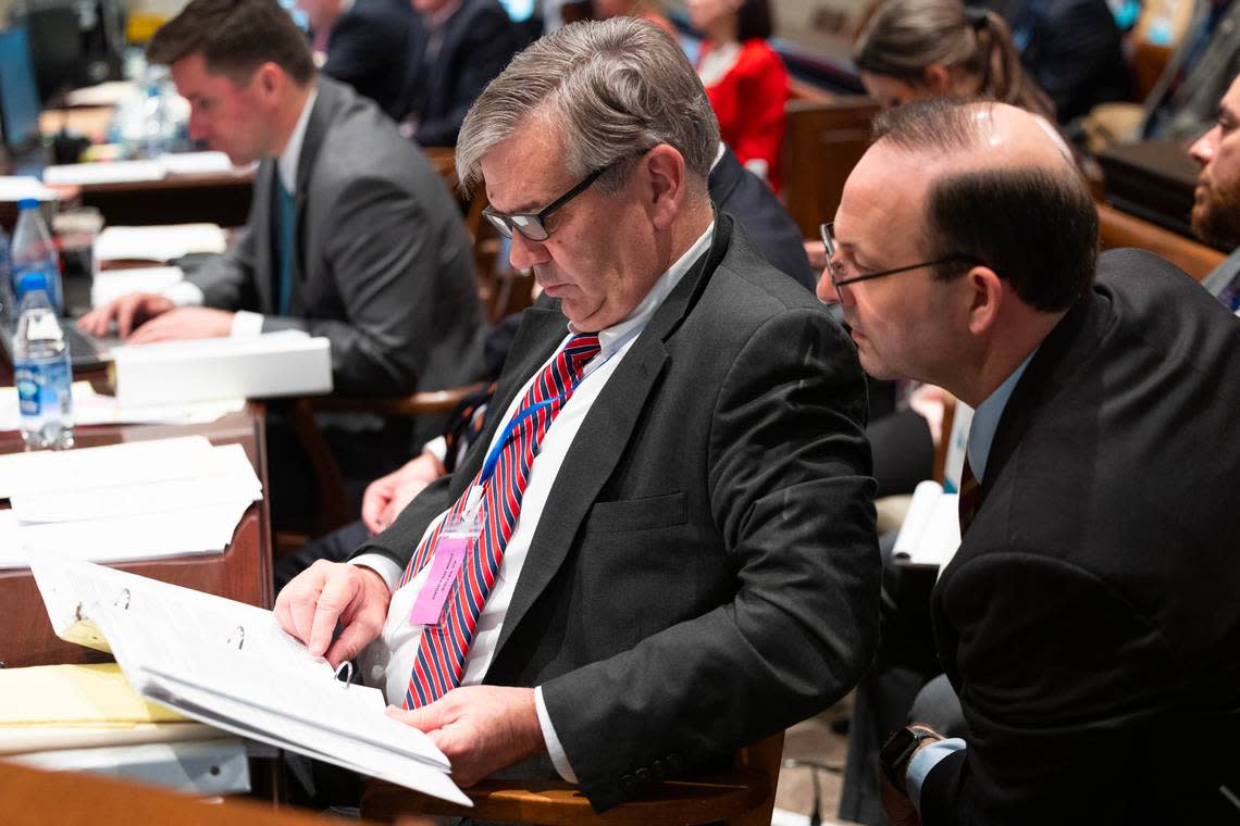 Prosecutor John Meadors shows information to South Carolina Attorney General Alan Wilson before Alex Murdaugh’s trial for murder resumes at the Colleton County Courthouse on Tuesday, Jan. 31, 2023. Joshua Boucher/The State/Pool