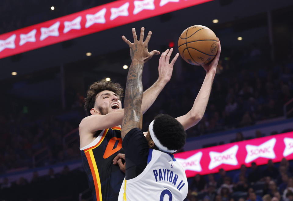 Nov 3, 2023; Oklahoma City, Oklahoma, USA; Oklahoma City Thunder forward Chet Holmgren (7) goes to the basket against Golden State Warriors guard <a class="link " href="https://sports.yahoo.com/nba/players/5739" data-i13n="sec:content-canvas;subsec:anchor_text;elm:context_link" data-ylk="slk:Gary Payton II;sec:content-canvas;subsec:anchor_text;elm:context_link;itc:0">Gary Payton II</a> (0) during the second quarter at Paycom Center. Mandatory Credit: Alonzo Adams-USA TODAY Sports