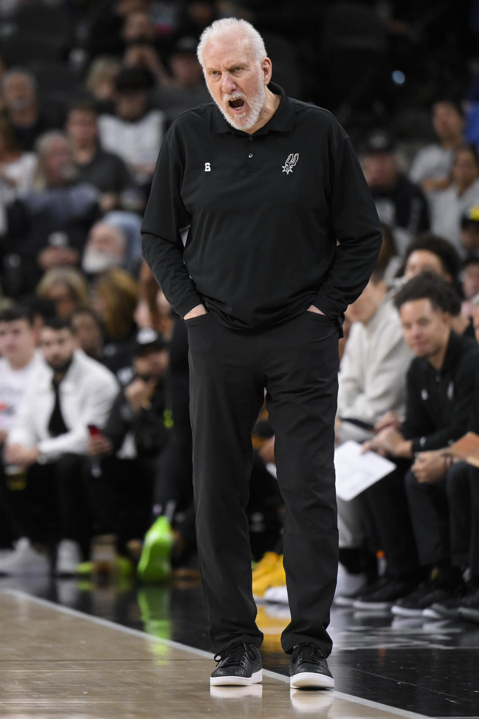 San Antonio Spurs head coach Gregg Popovich yells to his players during the second half of an NBA basketball game against the Portland Trail Blazers, Wednesday, Dec. 14, 2022, in San Antonio. Portland won 128-112. (AP Photo/Darren Abate)