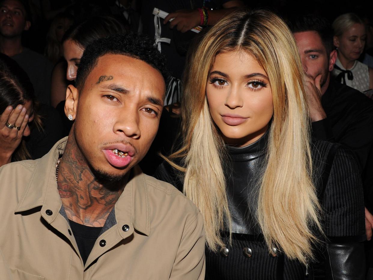 Tyga (L) and Kylie Jenner attend the Alexander Wang Spring 2016 fashion show during New York Fashion Week at Pier 94 on September 12, 2015 in New York City