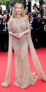 <p>The singer went sheer in an embellished gown with floor-grazing sleeves and shoulder cut-outs at Cannes' 70th anniversary event. </p>