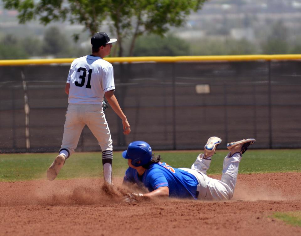 Maddux Edmonson (31) waits for the throw from right field as the Los Lunas base runner is safe at second.  Organ Mountain took on the Tigers from Los Lunas in a best of three series on Saturday, May 7, 2022.