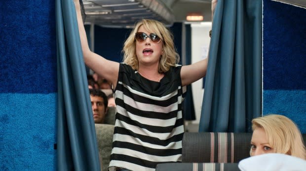 You don't need to sneak into first class like Annie (Kristen Wiig) in the film Bridesmaids. Image: Universal Pictures