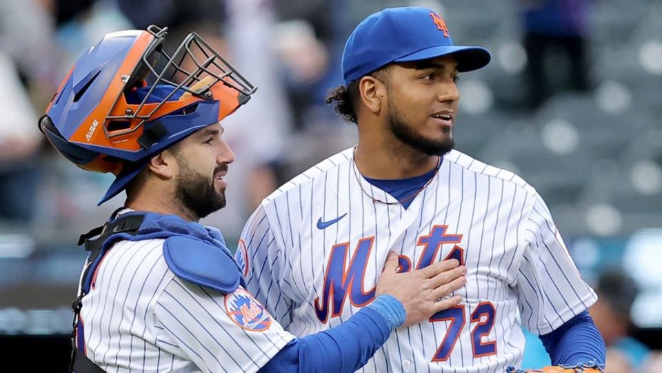 Apr 7, 2023; New York City, New York, USA; New York Mets catcher Tomas Nido (3) and relief pitcher Denyi Reyes (72) celebrate together after defeating the Miami Marlins at Citi Field.