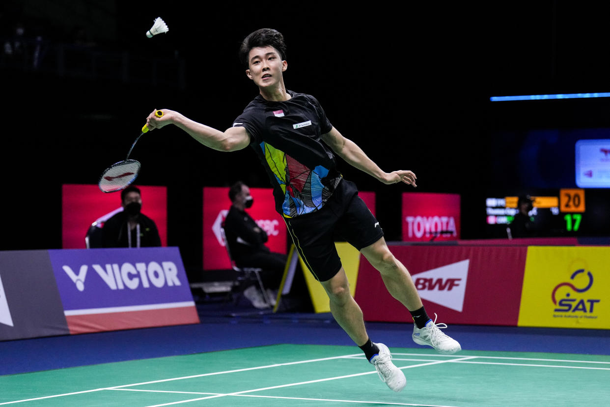 Singapore shuttler Loh Kean Yew in action against Indonesia's Anthony Sinisuka Ginting at the Thomas Cup. 