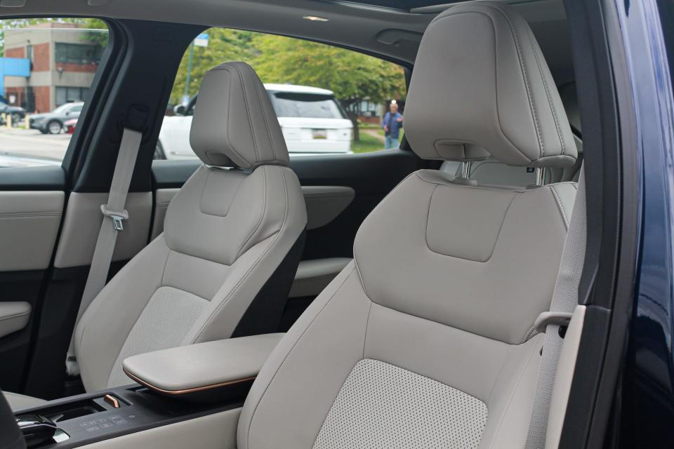 White leather seats in the 2023 Nissan Ariya electric SUV.