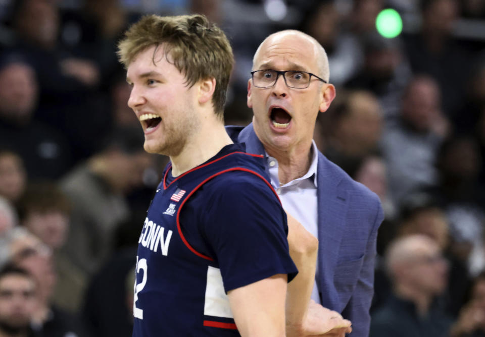 UConn coach Dan Hurley reacts after guard Cam Spencer (12) scored 3 points during the first half of the team's NCAA college basketball game against Providence, Saturday, March 9, 2024, in Providence, R.I. (AP Photo/Mark Stockwell)