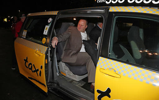 Gerard Gallant, former Florida Panthers head coach, gets into a cab after being relieved of his duties following an NHL hockey game against the Carolina Hurricanes, Sunday, Nov. 27, 2016, in Raleigh, N.C. (AP Photo/Karl B DeBlaker)