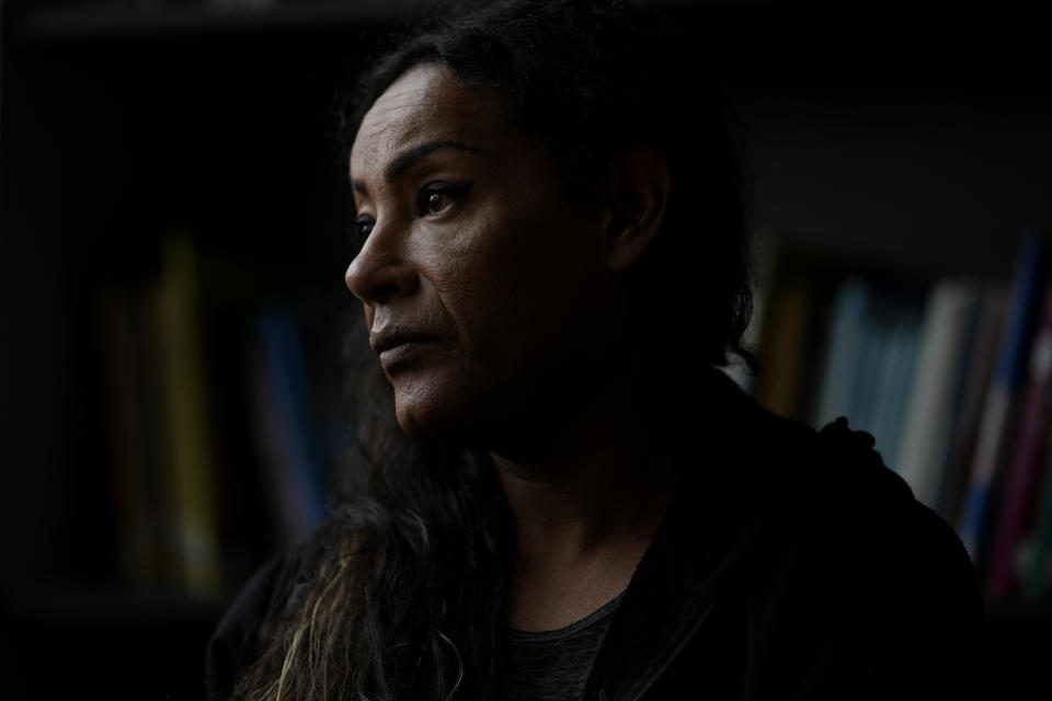 Luana Salva, a trans woman, poses for a portrait in Buenos Aires, Argentina, Tuesday, April 16, 2024. Salva had an administrative job at the foreign ministry thanks to a 2021 law that reserved 1% of public sector jobs for trans people but was dismissed as part of President Javier Milei's austerity program. (AP Photo/Natacha Pisarenko)