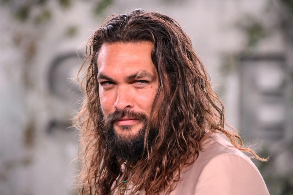 <div><p>"I went to a con and caught an elevator one day to get to a panel on another floor. I was in a wheelchair. When the elevator opened its doors, there was Jason Momoa! He was a sweetheart and insisted on pulling me in. He also insisted on pushing me out on my floor, even though he was heading for an entirely different floor, and took a picture with me. Great guy, very sweet and funny, and BTW, HUGE."</p><p>—<a href="https://www.buzzfeed.com/insertwithere" rel="nofollow noopener" target="_blank" data-ylk="slk:InsertWitHere;elm:context_link;itc:0;sec:content-canvas" class="link ">InsertWitHere</a></p></div><span> Nick Agro / AFP via Getty Images</span>