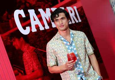 Actor Charles Melton enjoys a Campari aperitif at Campari: Discover Red event experience ahead of his premiere for May December at the 76th Annual Festival de Cannes