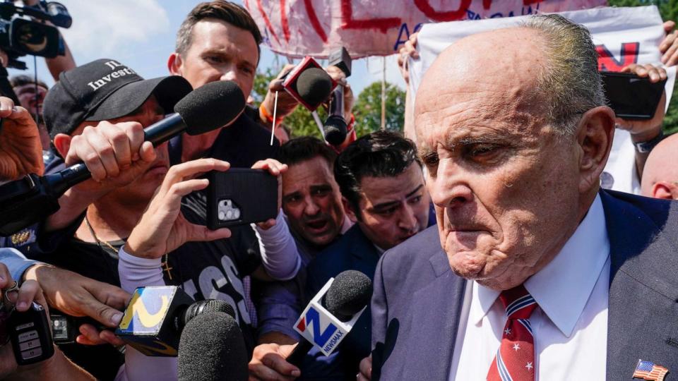 PHOTO: Rudy Giuliani speaks outside the Fulton County jail, Aug. 23, 2023, in Atlanta. (Brynn Anderson/AP)