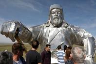 People visit the Genghis Khan Equestrian Statue at the Genghis Khan Statue Complex, east of Ulaanbaatar