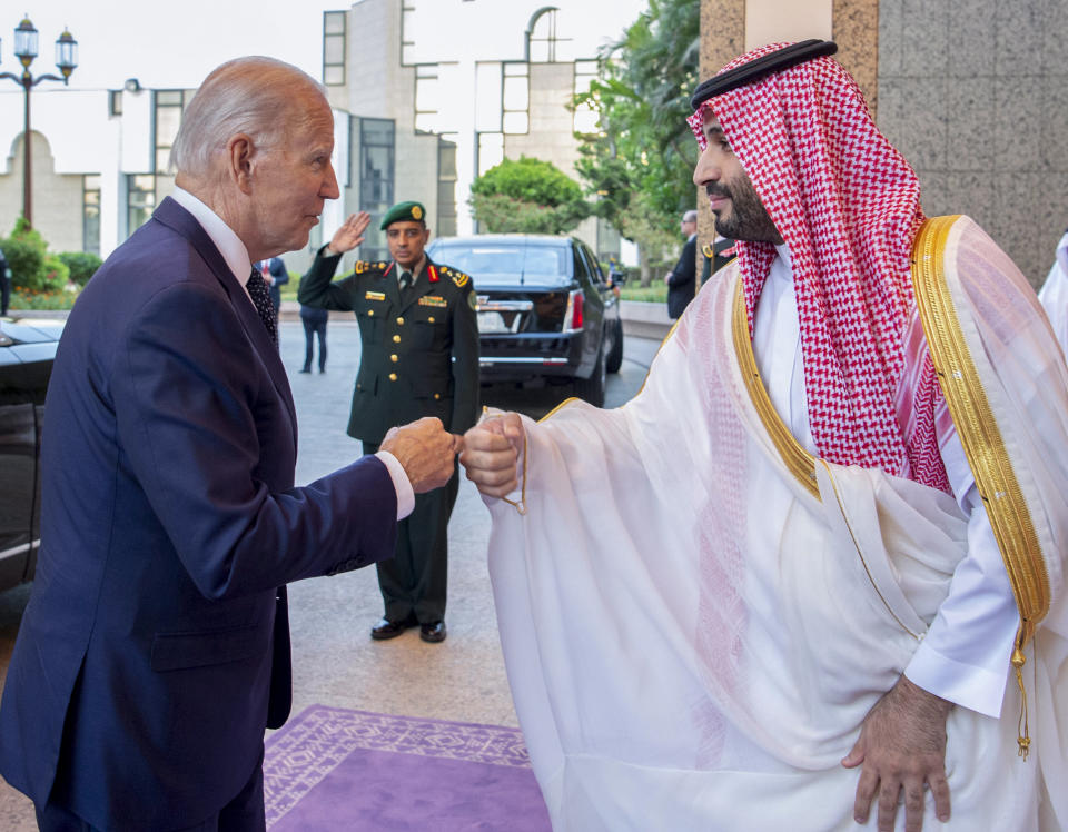 FILE - In this image released by the Saudi Royal Palace, Saudi Crown Prince Mohammed bin Salman, right, greets President Joe Biden with a fist bump after his arrival at Al-Salam palace in Jeddah, Saudi Arabia, July 15, 2022. (Bandar Aljaloud/Saudi Royal Palace via AP, File)