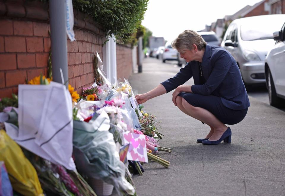 Home Secretary Yvette Cooper looks at tributes near the scene in Hart Street (James Speakman/PA Wire)