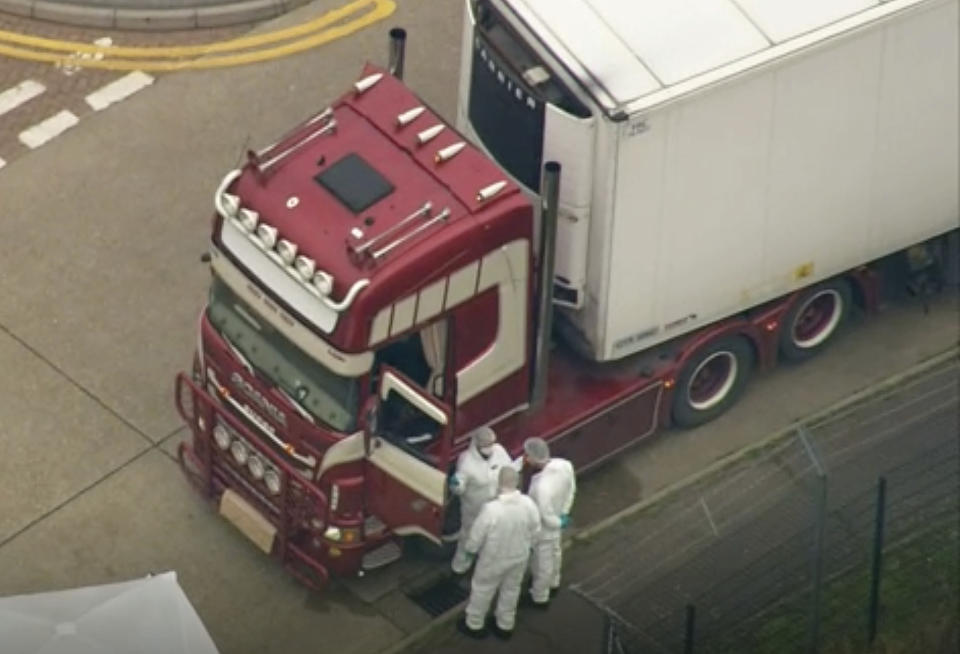 An aerial view as police forensic officers attend the scene after a truck was found to contain a large number of dead bodies, in Thurrock, South England, early Wednesday Oct. 23, 2019. Police in southeastern England said that 39 people were found dead Wednesday inside a truck container believed to have come from Bulgaria. (UK Pool via AP)