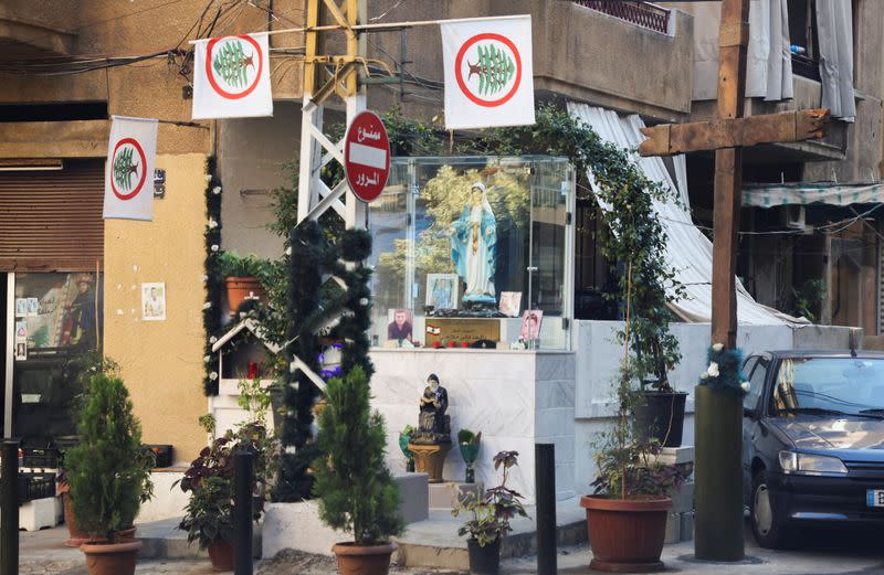 Flags of Lebanese Forces political party flutter in Furn El Chebbak