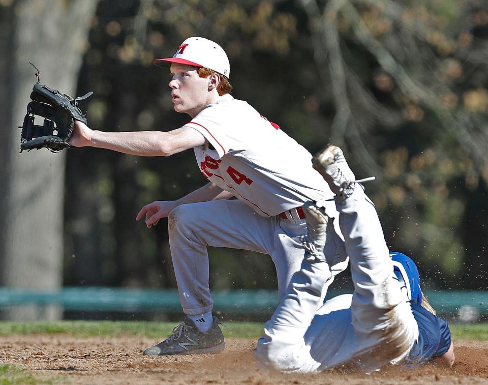 Milton second baseman Sean McDougal gets ready to tag a St. Mary's Lynn runner at Cunningham Field on Friday, May 5, 2023.