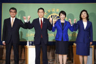 FILE - In this Sept. 18, 2021, file photo, Candidates for the presidential election of the ruling Liberal Democratic Party pose for photographers prior to a debate session held by Japan National Press club in Tokyo. The contenders are, from left to right, Taro Kono, the cabinet minister in charge of vaccinations, Fumio Kishida, former foreign minister, Sanae Takaichi, former internal affairs minister, and Seiko Noda, former internal affairs minister. The inclusion of two women among the four candidates vying to become the next prime minister seems like a big step forward for Japan's notoriously sexist politics. (AP Photo/Eugene Hoshiko, File)