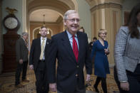 <p>Senate Majority Leader Mitch McConnell, R-Ky., walks to the chamber on the first morning of a government shutdown after a divided Senate rejected a funding measure last night, at the Capitol in Washington, Saturday, Jan. 20, 2018. (Photo: J. Scott Applewhite/AP) </p>