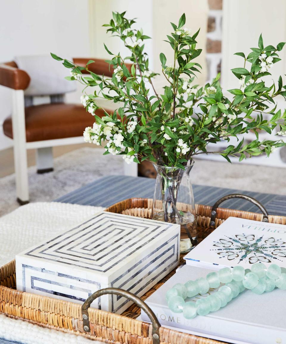 coffee table with tray and foliage