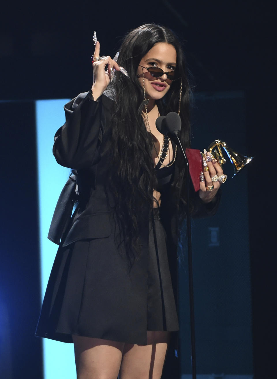 Rosalia accepts the award for album of the year for "El Mal Querer" at the 20th Latin Grammy Awards on Thursday, Nov. 14, 2019, at the MGM Grand Garden Arena in Las Vegas. (AP Photo/Chris Pizzello)