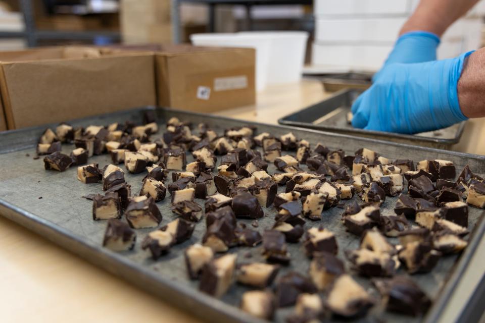 Peanut butter cream candies are prepared to be used in a batch of Schneider's Sweet Shop's chocolate peanut butter chunk flavored ice cream.