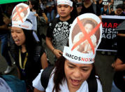 Protesters shout anti-government slogans during a protest at Luneta park, metro Manila, Philippines November 25, 2016, denouncing the burial of late dictator Ferdinand Marcos at the Libingan ng mga Bayani (Heroes' cemetery) last week. REUTERS/Romeo Ranoco