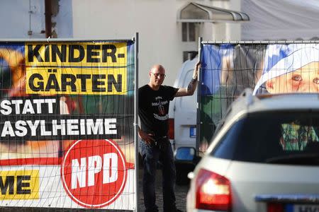 Far-right supporter attends rock music festival "Schwert und Schild" (Sword and Shield) in Ostritz, Germany April 20, 2018. REUTERS/Hannibal Hanschke