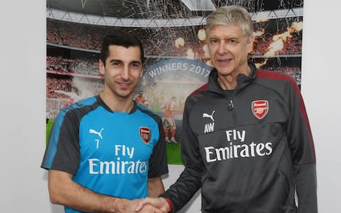 Henrikh Mkhitaryan and Arsene Wenger - Credit: Getty images