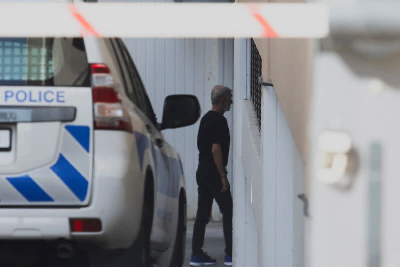 David Hunter, British pensioner facing murder charges over the death of his wife, enters a courthouse in Paphos