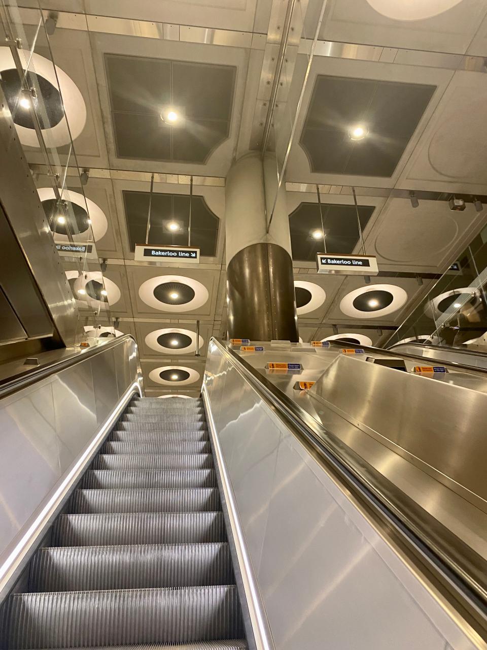 Escalators to Elizabeth line in Paddington station.