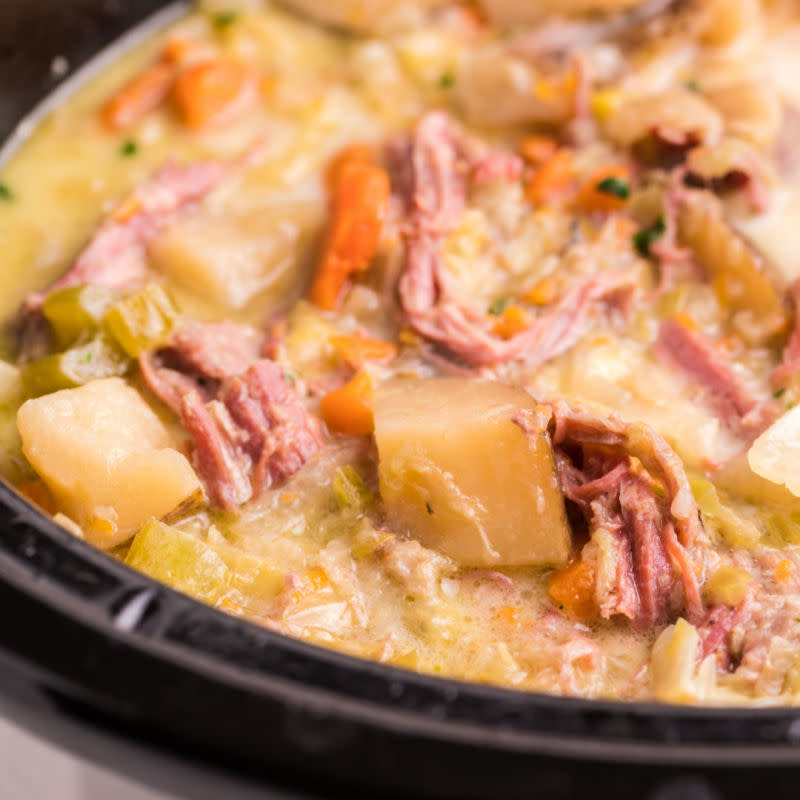 <p>The Magical Slow Cooker</p><p>Creamy soup filled with chunks of corned beef, potatoes and cabbage.</p><p><strong>Get the Recipe: <a href="https://www.themagicalslowcooker.com/slow-cooker-corned-beef-and-cabbage-soup/" rel="nofollow noopener" target="_blank" data-ylk="slk:Crock Pot Corned Beef and Cabbage Soup;elm:context_link;itc:0;sec:content-canvas" class="link ">Crock Pot Corned Beef and Cabbage Soup</a></strong></p>