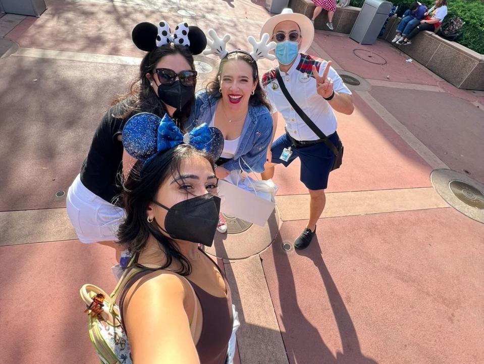 josephine and group taking a selfie with their vip tour guide at hollywood studios in disney world