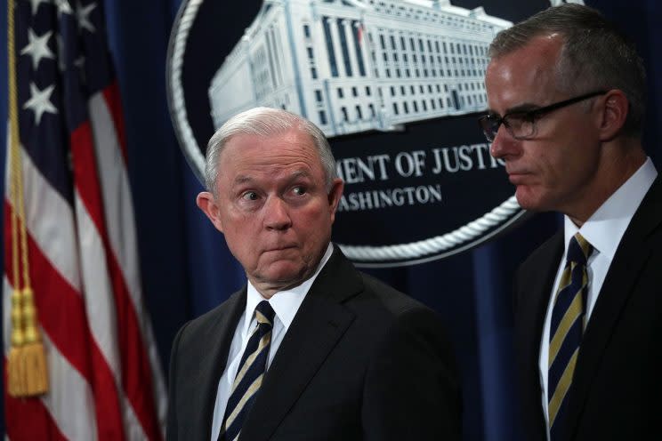 Attorney General Jeff Sessions, left, and acting FBI Director Andrew McCabe at a July 13 news conference. (Photo: Alex Wong/Getty Images)