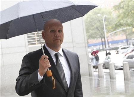 Former Madoff employee George Perez exits the Manhattan Federal Court in New York October 2, 2012. REUTERS/Brendan McDermid