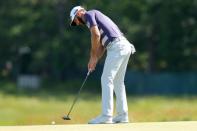 Jun 16, 2018; Southampton, NY, USA; Dustin Johnson putts the second green during the third round of the U.S. Open golf tournament at Shinnecock Hills GC - Shinnecock Hills Golf C. Mandatory Credit: Brad Penner-USA TODAY Sports