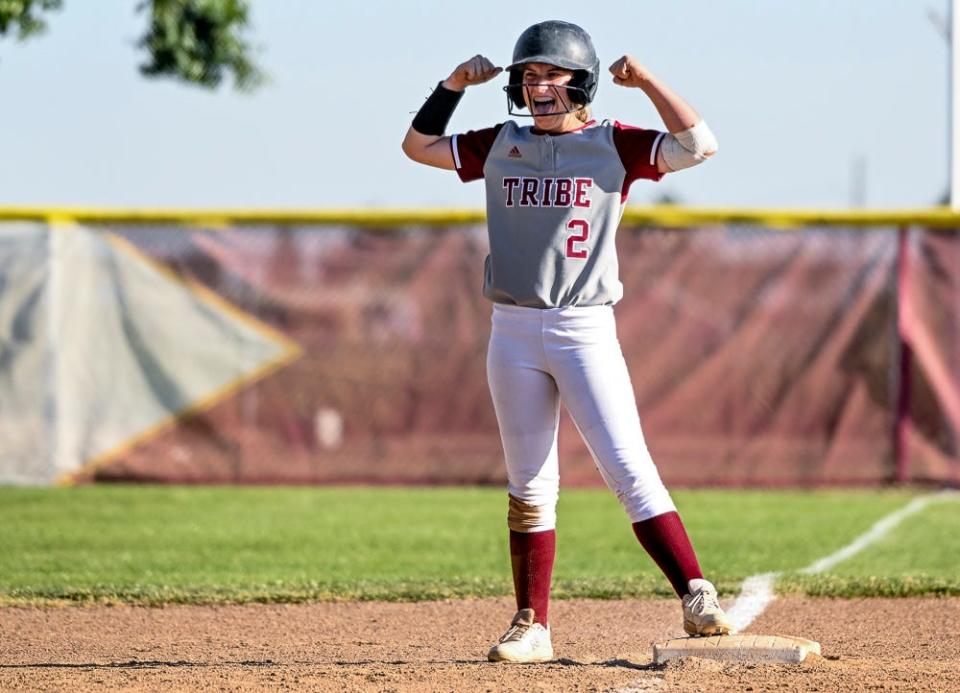 Tulare Union's Maris Pinheiro celebrates a hit against Reedley in a Division III CIF Central Section Softball Championship playoff Wednesday, May 18, 2022. 