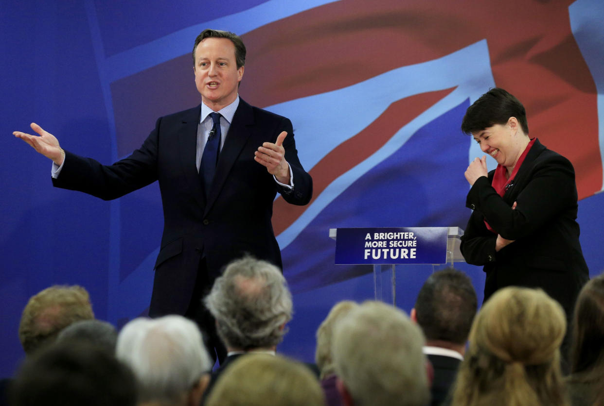 File photo dated 16/04/15 of Prime Minister David Cameron and Leader of the Scottish Conservative and Unionist Party Ruth Davidson respond to questions from media at the launch of the Scottish Conservatives' election manifesto at the Emirates Arena, Glasgow. Ms Davidson has confirmed she is stepping down as leader of the Scottish Conservatives.