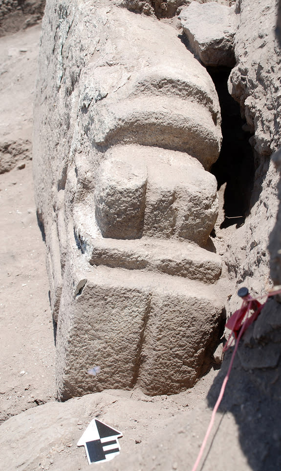 Carvings at the front end of the crocodile stone represent the animal's snout.