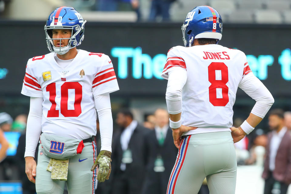 Eli's back: Daniel Jones, right, has a sprained ankle so Eli Manning, left, will likely start for the New York Giants on Monday. (Rich Graessle/Icon Sportswire via Getty Images)