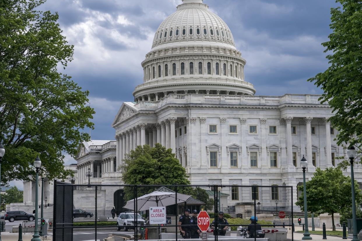 Above it, only skies. Inside, very few nonbelievers. <a href="https://newsroom.ap.org/detail/CongressDividedRepublicans/234f149c221f4d84a8e53c9f782c3748/photo?Query=sky%20capitol&mediaType=photo&sortBy=arrivaldatetime:desc&dateRange=Anytime&totalCount=255&currentItemNo=22" rel="nofollow noopener" target="_blank" data-ylk="slk:AP Photo/J. Scott Applewhite;elm:context_link;itc:0;sec:content-canvas" class="link ">AP Photo/J. Scott Applewhite</a>