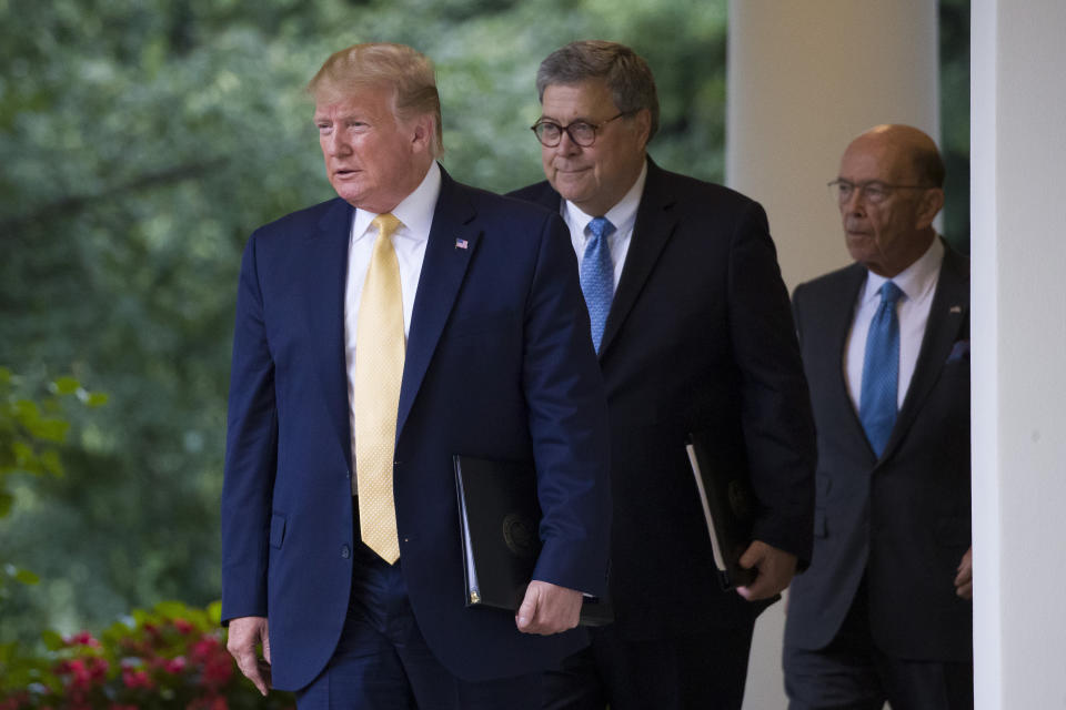 President Donald Trump arrives with Commerce Secretary Wilbur Ross and Attorney General William Barr to speak about the 2020 census in the Rose Garden at the White House in Washington, Thursday, July 11, 2019. (AP Photo/Alex Brandon)