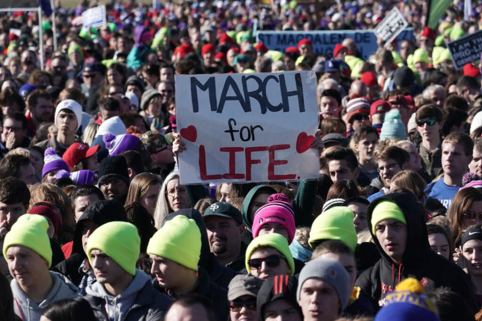 Anti-abortion activists gather at the National Mall in Washington on Jan. 19, 2018, ahead of the annual March for Life rally. (Photo by Alex Wong/Getty Images)