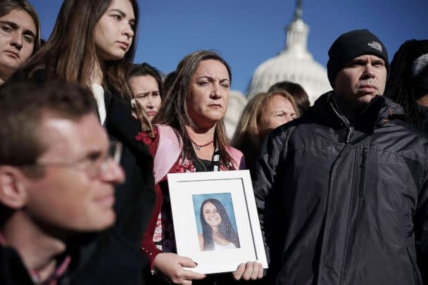 PHOTO: Lori Alhadeff and her husband Ilan Alhadeff right, hold a picture of their daughter Alyssa Alhadeff, a Marjory Stoneman Douglas High School shooting victim, during a news conference on gun control March 23, 2018 on Capitol Hill in Washington, D.C. (Alex Wong/Getty Images)