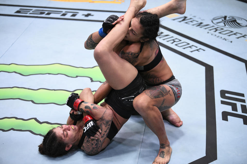 LAS VEGAS, NEVADA – SEPTEMBER 19: (L-R) Mayra Bueno Silva of Brazil secures an arm bar submission against Mara Romero Borella of <a class="link " href="https://sports.yahoo.com/soccer/teams/italy-women/" data-i13n="sec:content-canvas;subsec:anchor_text;elm:context_link" data-ylk="slk:Italy;sec:content-canvas;subsec:anchor_text;elm:context_link;itc:0">Italy</a> in their flyweight bout during the UFC Fight Night event at UFC APEX on September 19, 2020 in Las Vegas, Nevada. (Photo by Chris Unger/Zuffa LLC)