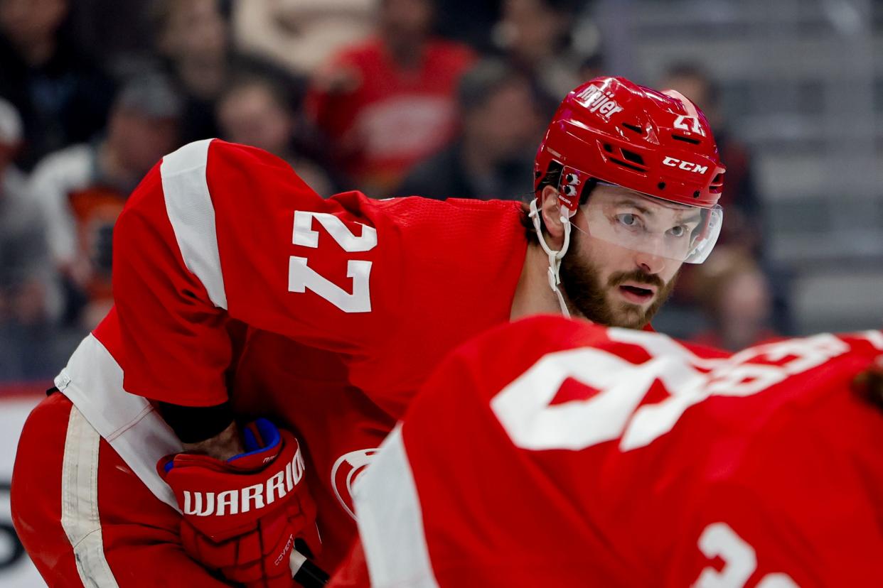 Detroit Red Wings center Michael Rasmussen (27) gets set during a faceoff in the first period against the Philadelphia Flyers at Little Caesars Arena in Detroit on Thursday, Jan. 25, 2024.